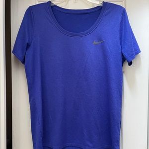 Four Nike Dri-fit athletic shirts